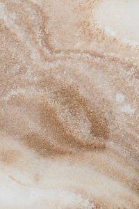 Elegant close-up of granite stone texture, perfect for backgrounds and design projects.